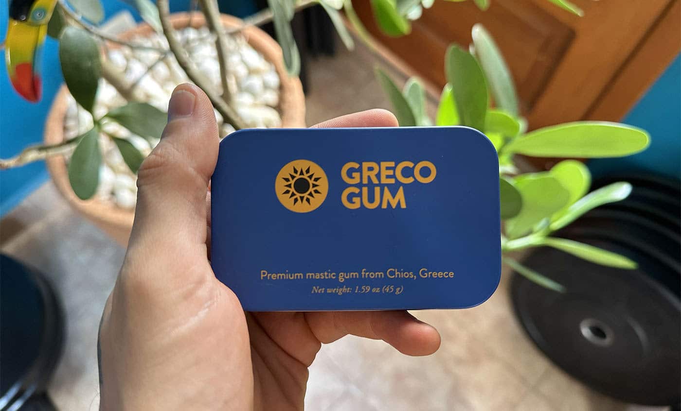 Photo of me holding a box of Greco Gum, a premium brand of mastic gum.