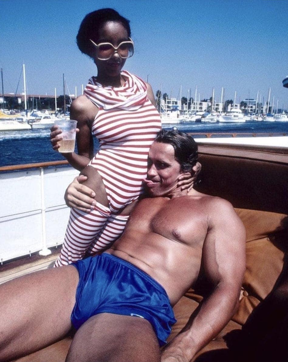Photo of the bodybuilder Arnold Schwarzenegger with a woman.